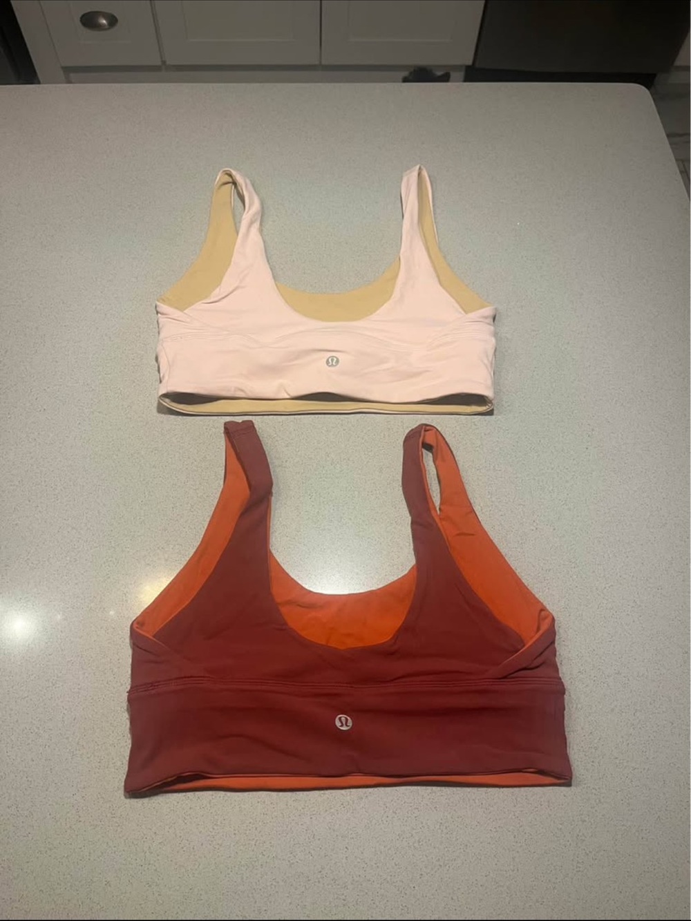 lululemon athletica Reversible Scoop Sports Bras — Light Pink & Rust Orange